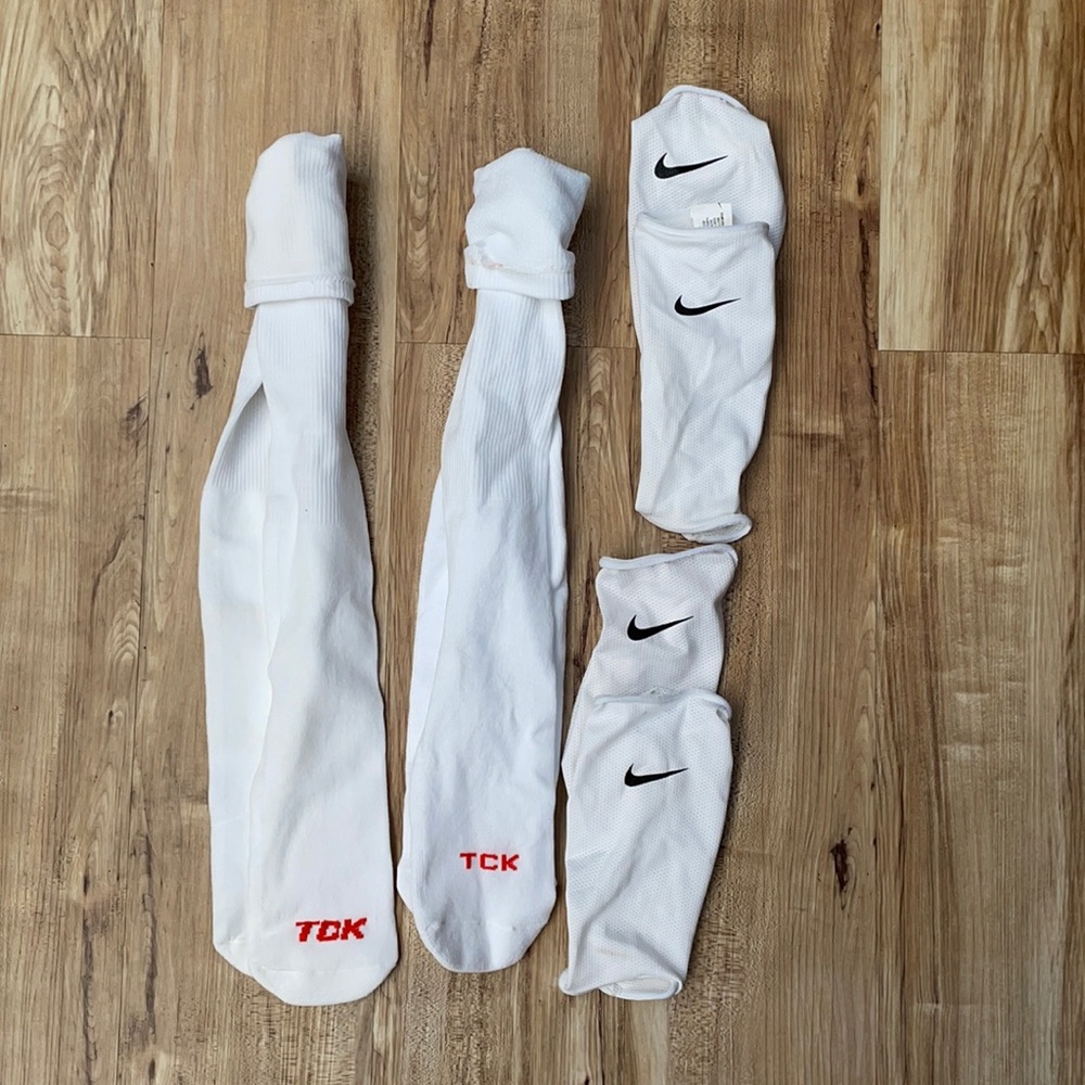 TCK soccer socks and Nike shin guard slide holders